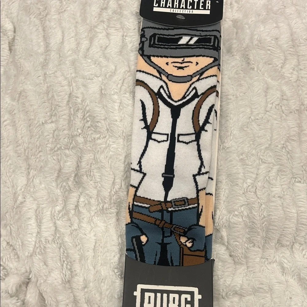 Spencer’s 1 pair of Bioworld PUBG character crew socks, size 10-13 new